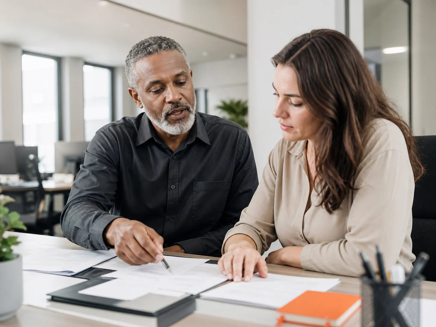 Staffing-firm operations team reviewing a client account handoff