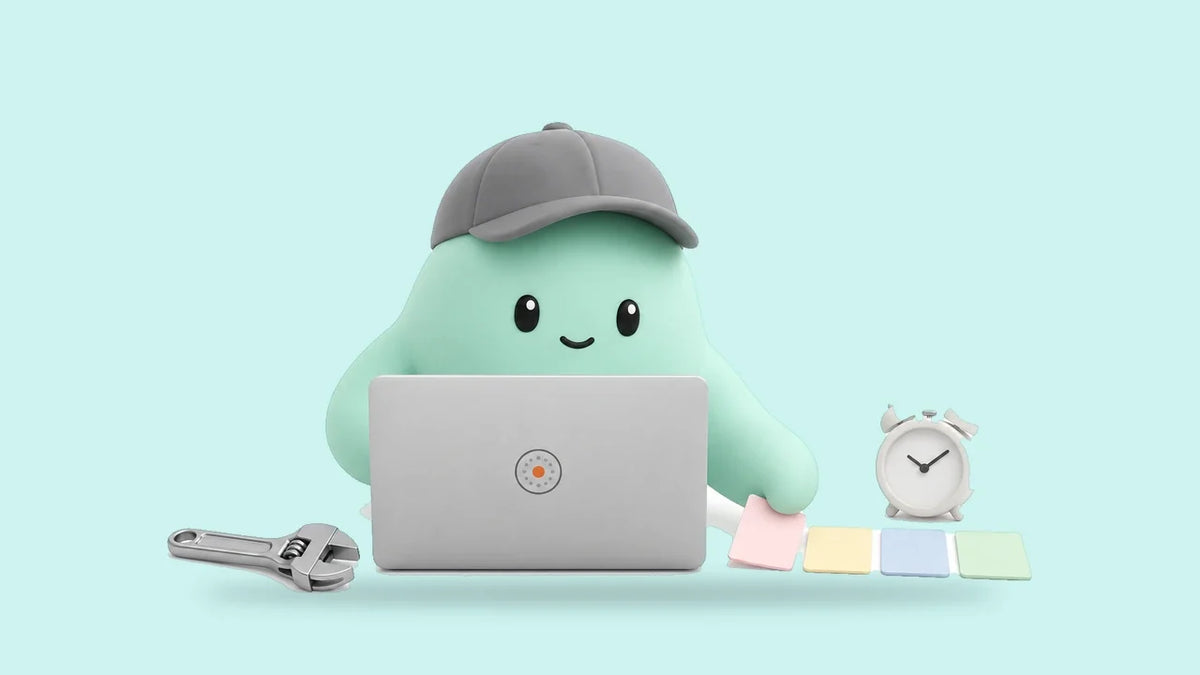 Hank at a laptop beside a wrench, an alarm clock and four colored job cards in a row
