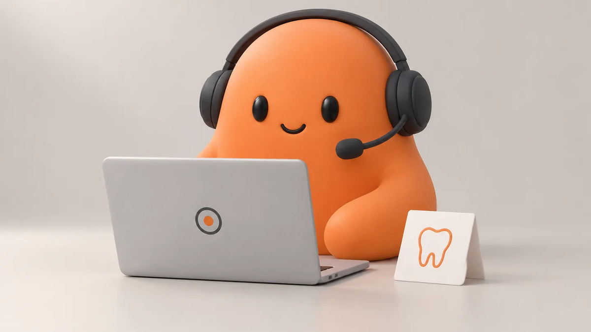 Illustration for Dental practice management software, job by job: Mia behind a closed laptop with a headset and a dental recall card