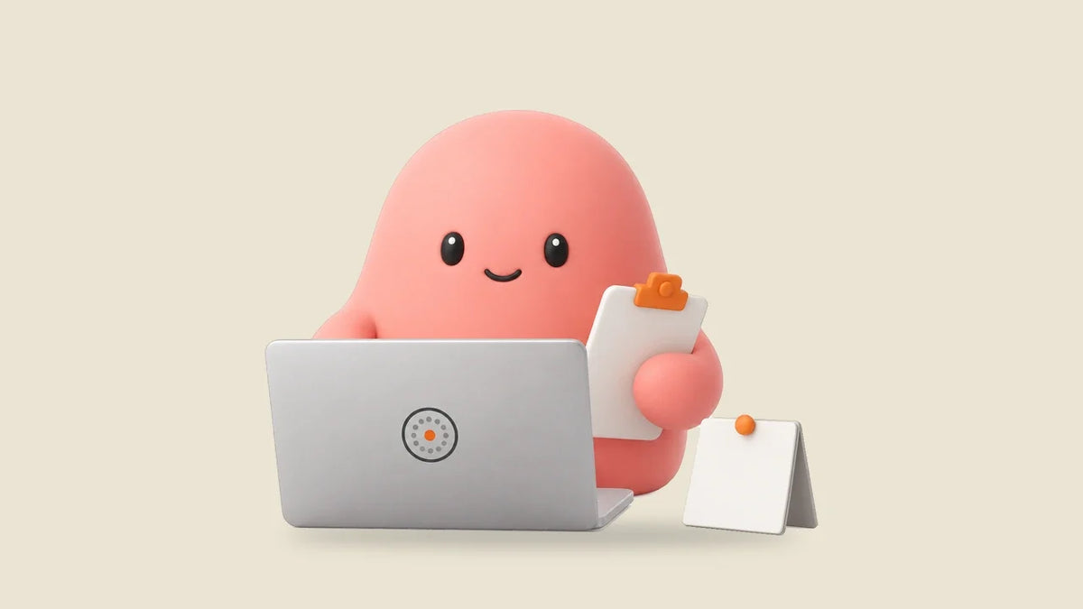 Olivia with a clipboard at a laptop beside a small desk calendar with an orange pin