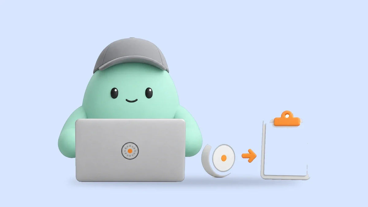 Hank at a laptop beside a small thermostat and a job card on a clipboard