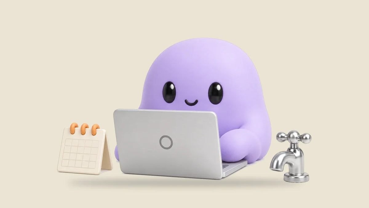 Reggie at a laptop beside a small calendar with orange pins and a toy faucet