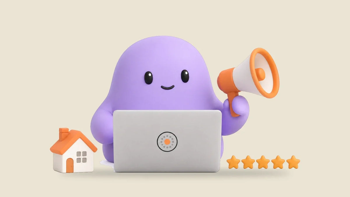 Reggie at a laptop beside a small house model and a row of five star tokens