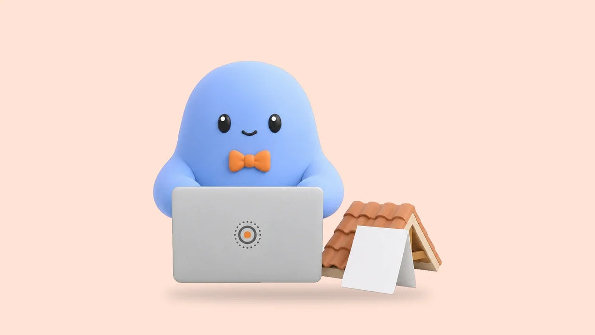 Cody at a laptop beside a small model roof and a folded estimate sheet