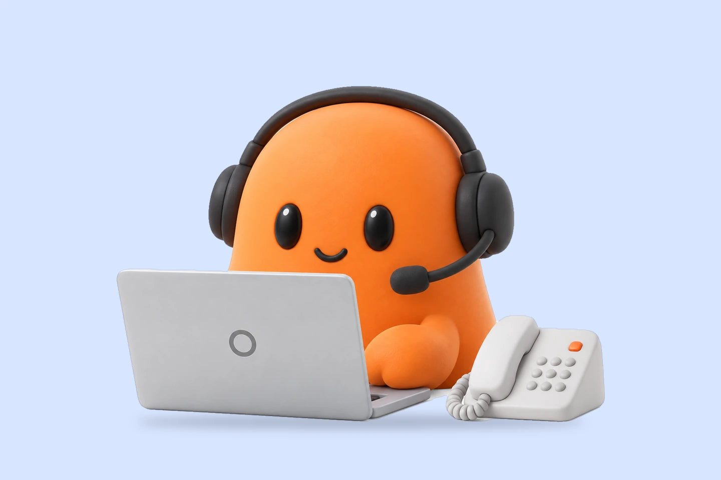 Mia beside a laptop and a desk phone with a small orange light