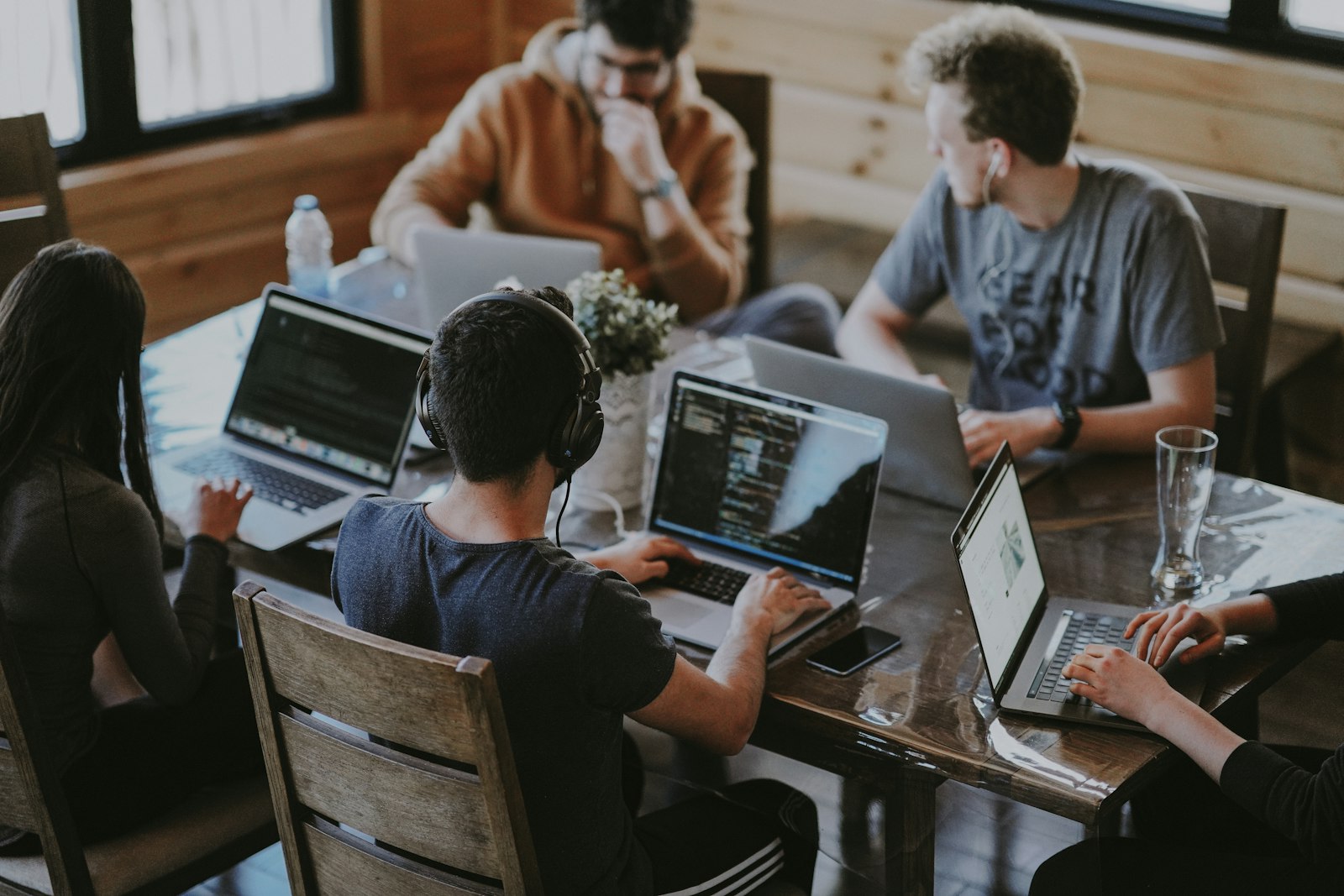A team collaborating around a table in a bright office