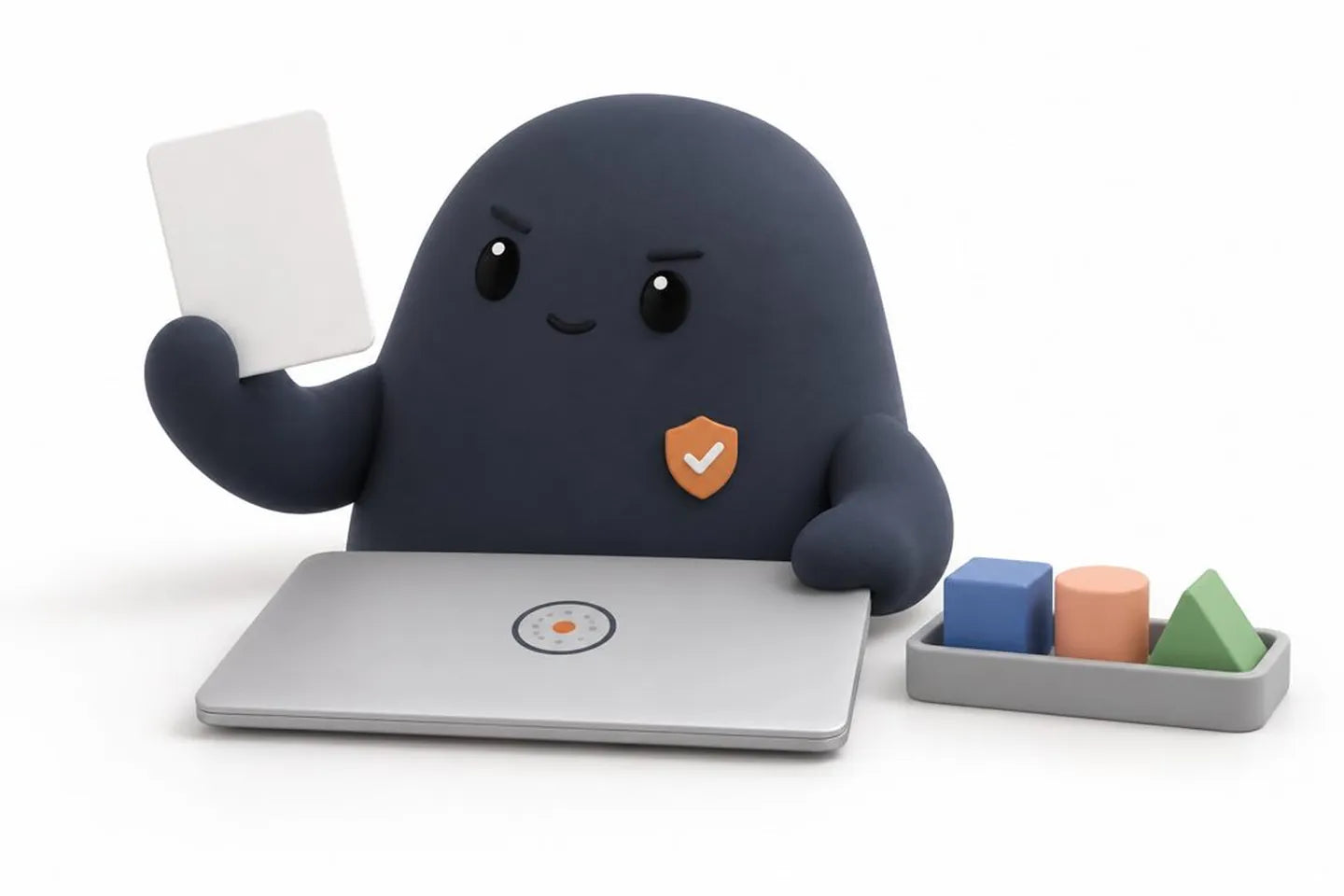 Sam holds up a blank draft card beside a closed laptop and a tray of toy blocks