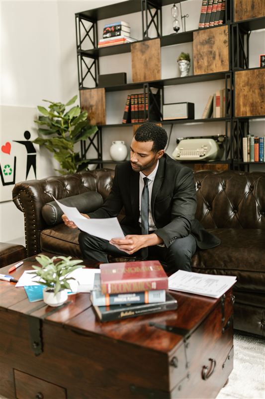 Defense attorney reviewing a case file