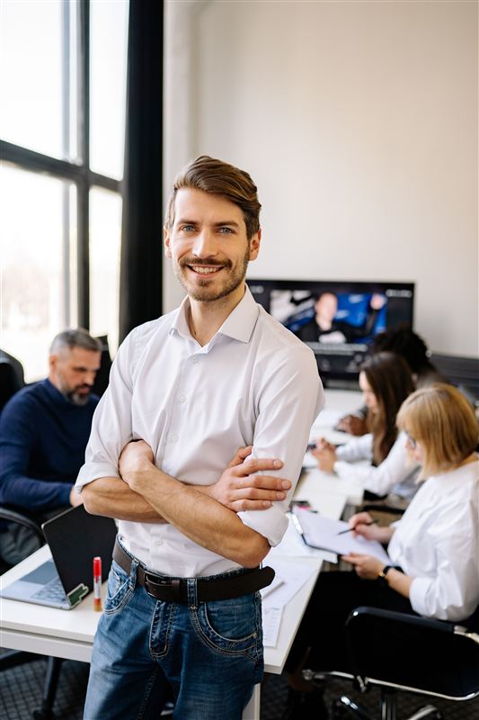 Agency professionals collaborating in an office